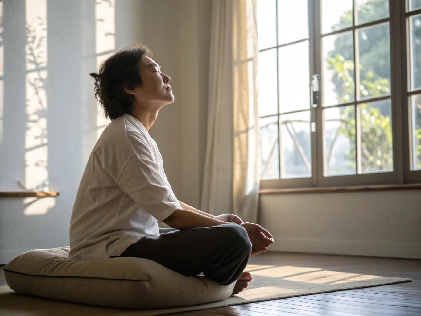 A serene image of a child peacefully practicing breathwork in a sunlit room, surrounded by calming colors and soft pillows, embodying the tranquility and focus achieved through breathwork at Mission All One.
